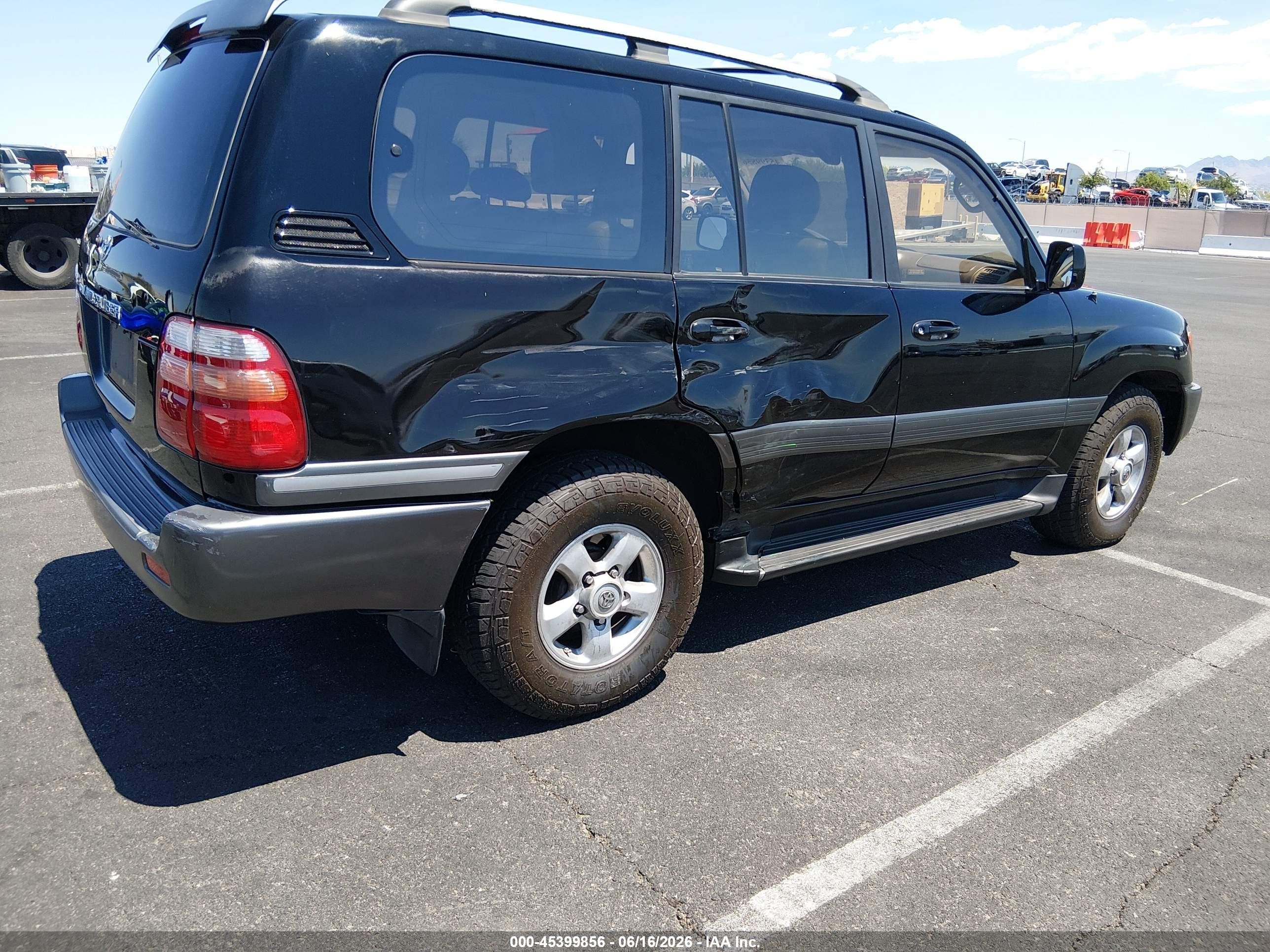 1999 Toyota Land Cruiser   Black vin: JT3HT05J5X0044456