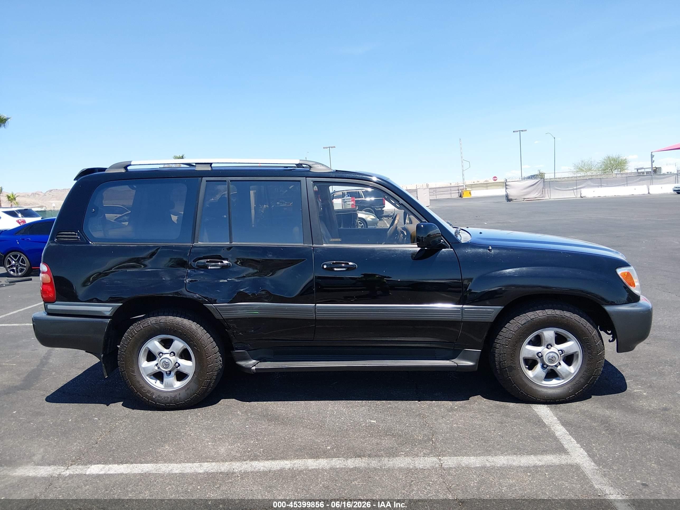 1999 Toyota Land Cruiser   Black vin: JT3HT05J5X0044456