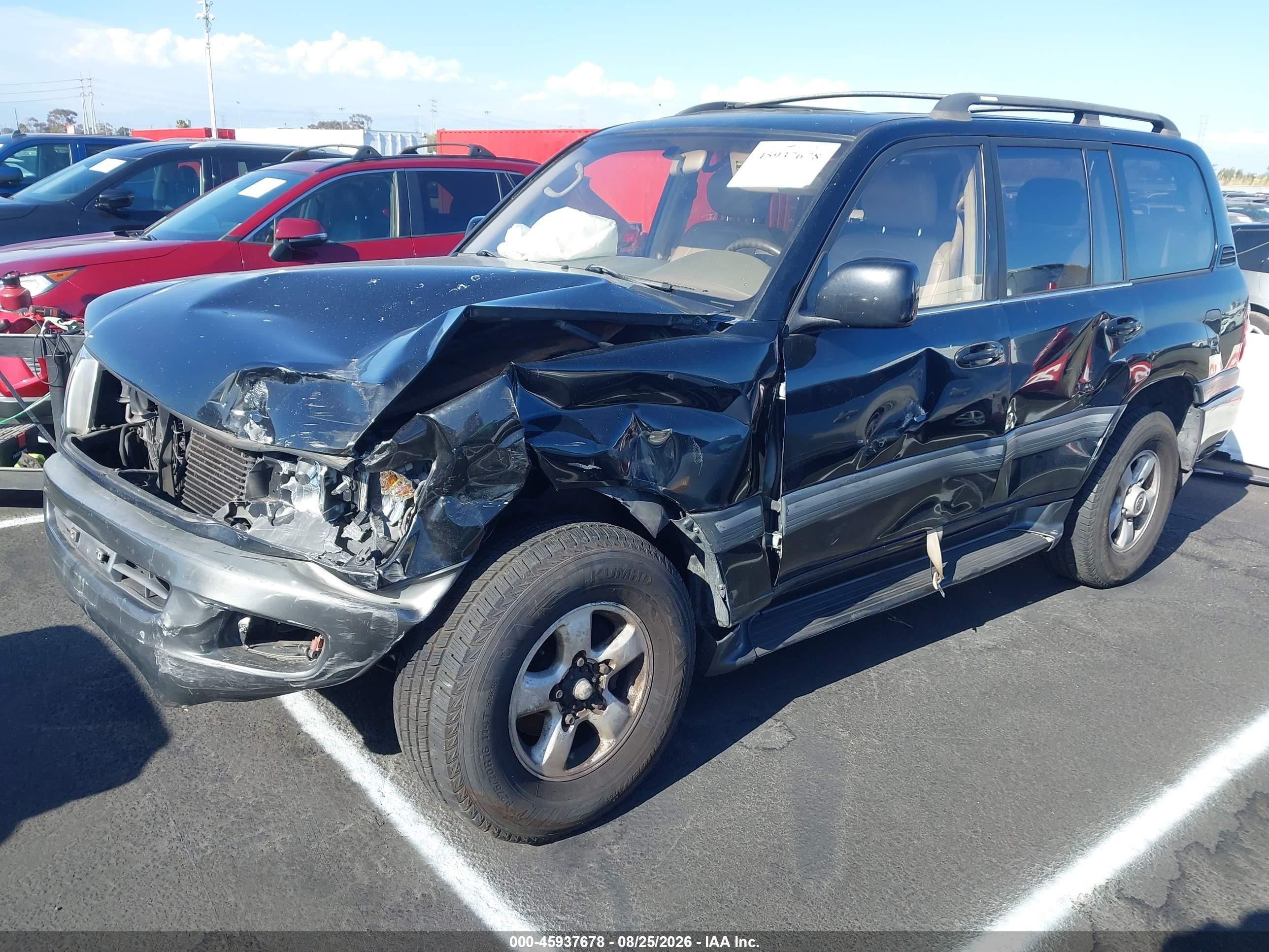 2000 Toyota Land Cruiser   Black vin: JT3HT05J5Y0116757