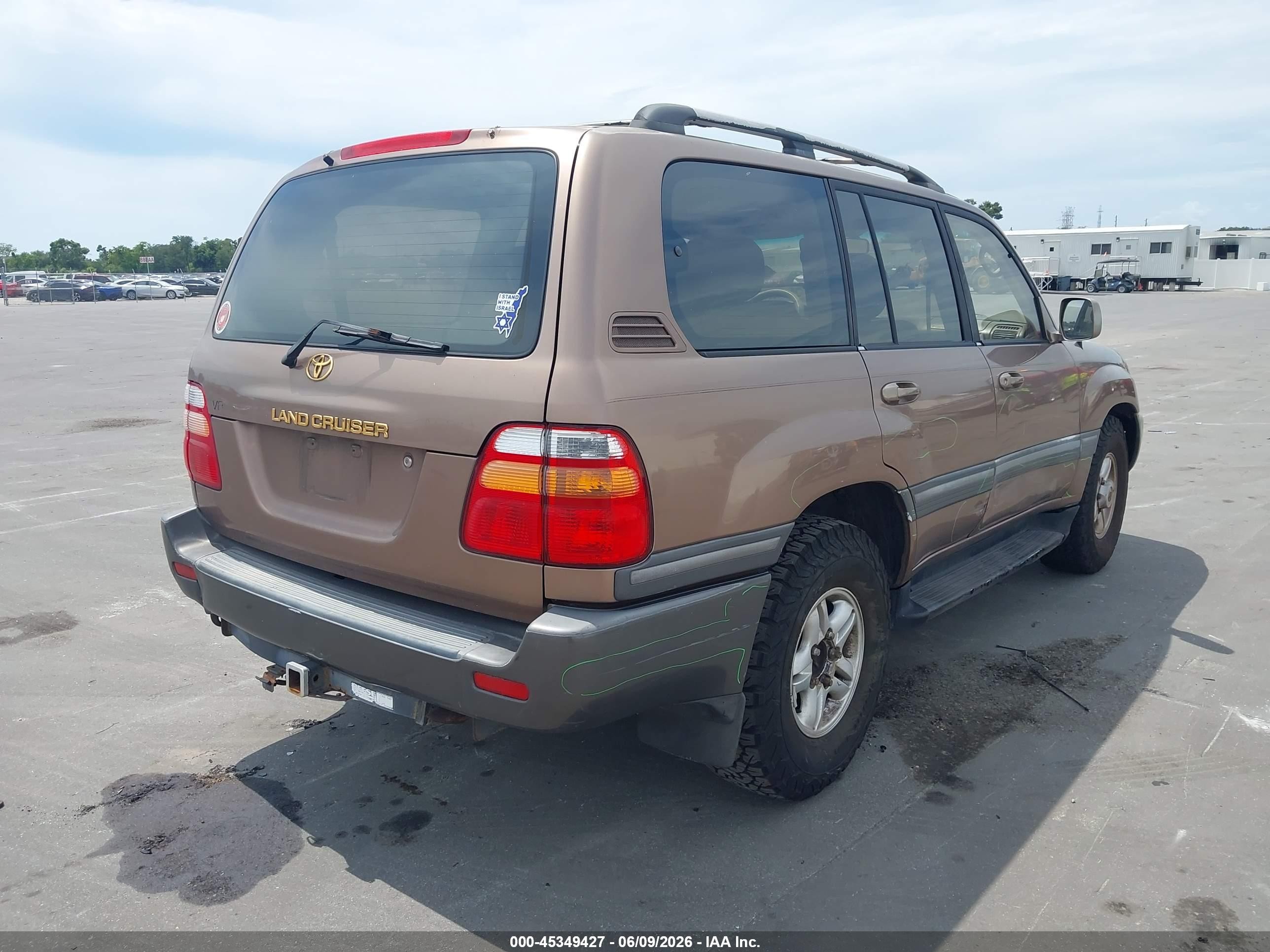 1998 Toyota Land Cruiser   Brown vin: JT3HT05J8W0016732
