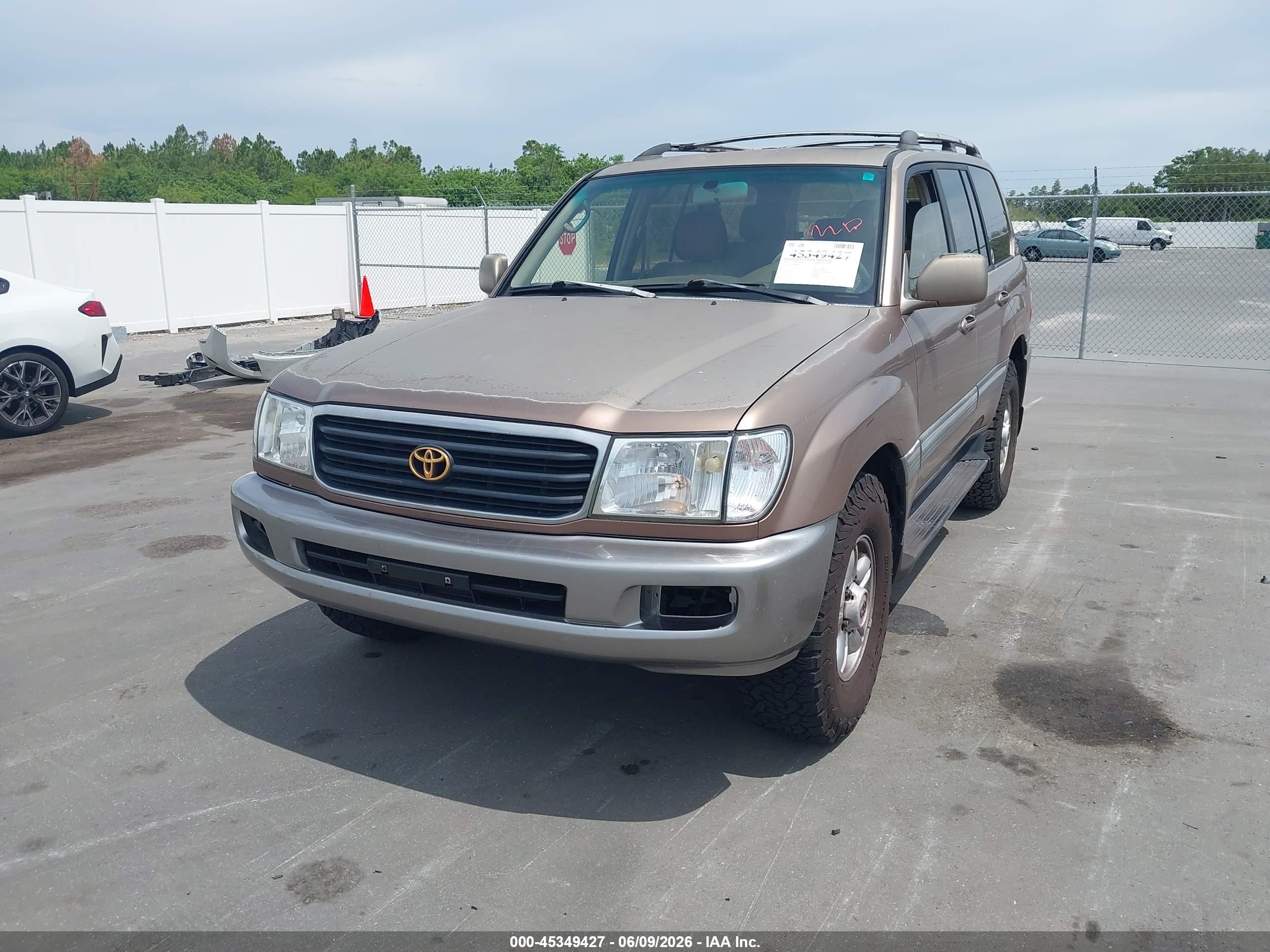 1998 Toyota Land Cruiser   Brown vin: JT3HT05J8W0016732