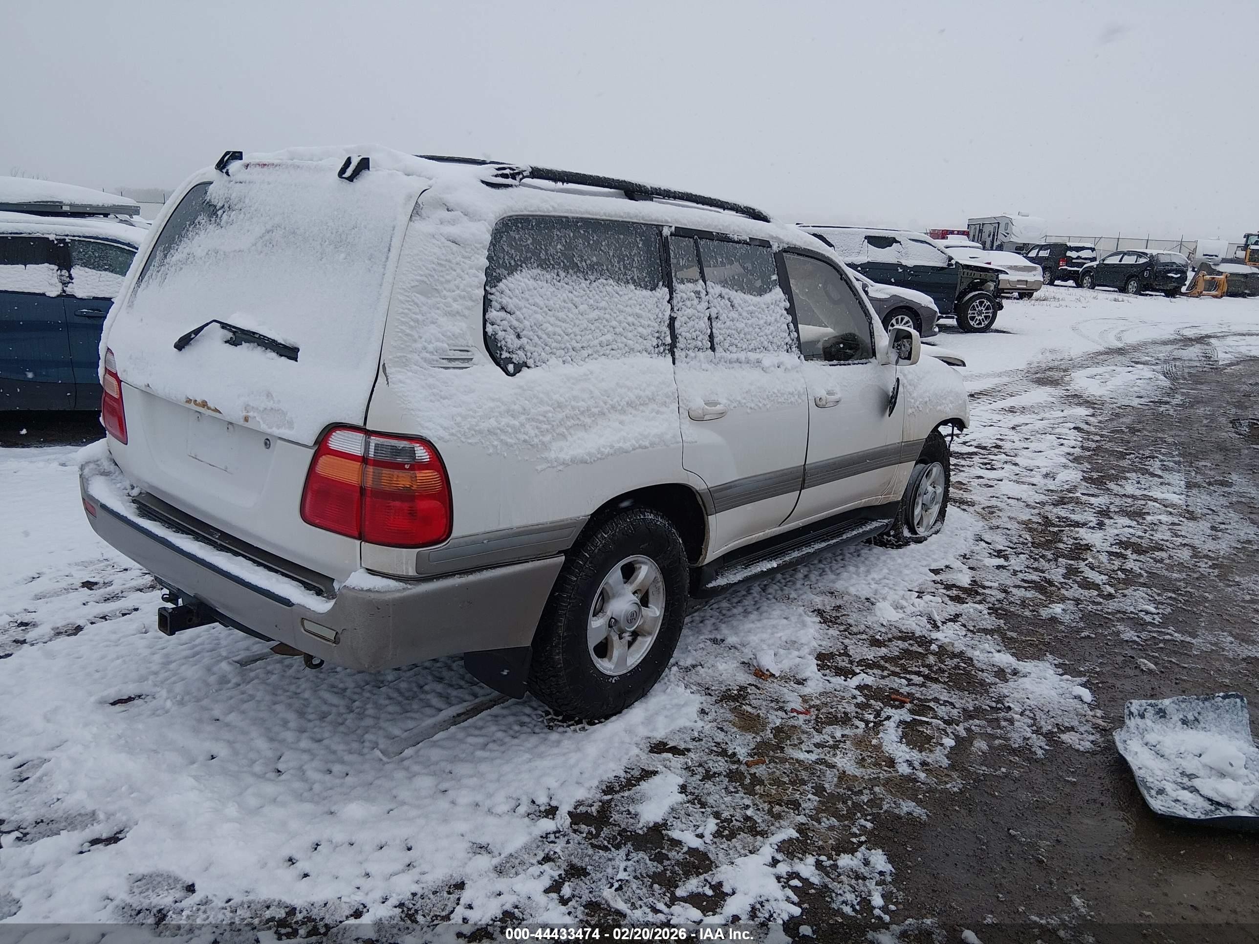 1999 Toyota Land Cruiser   White vin: JT3HT05J8X0052650