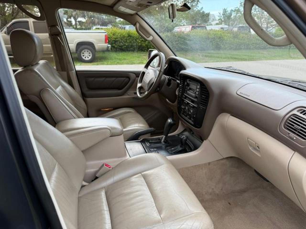 1999 Toyota Land Cruiser    Gold vin: JT3HT05J8X0071781