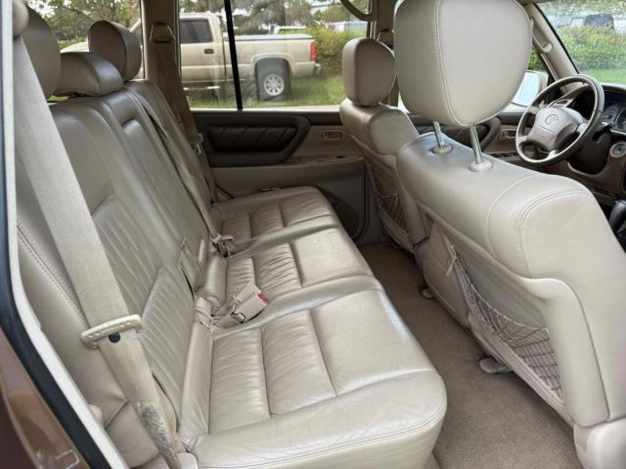 1999 Toyota Land Cruiser    Gold vin: JT3HT05J8X0071781