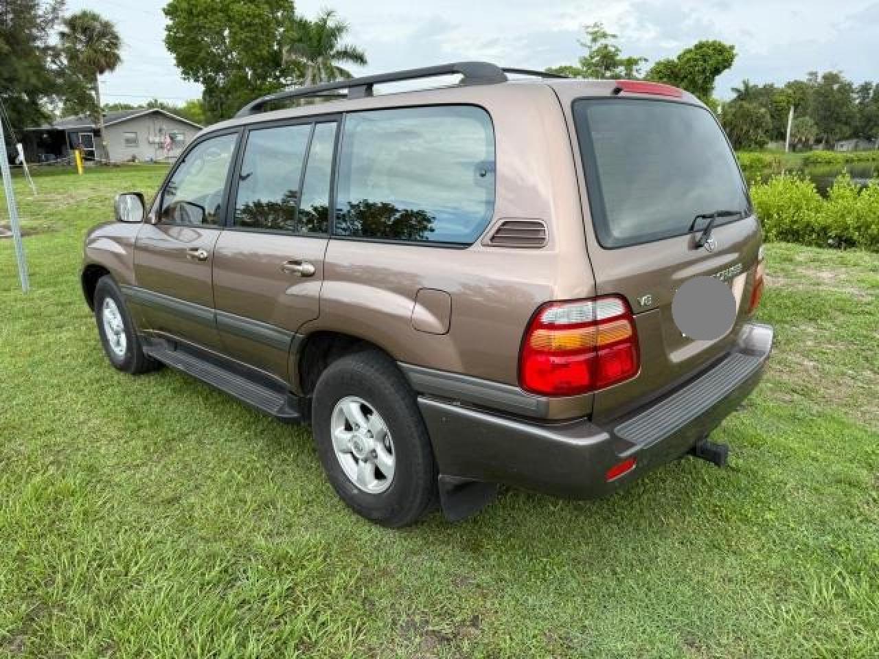 1999 Toyota Land Cruiser    Gold vin: JT3HT05J8X0071781