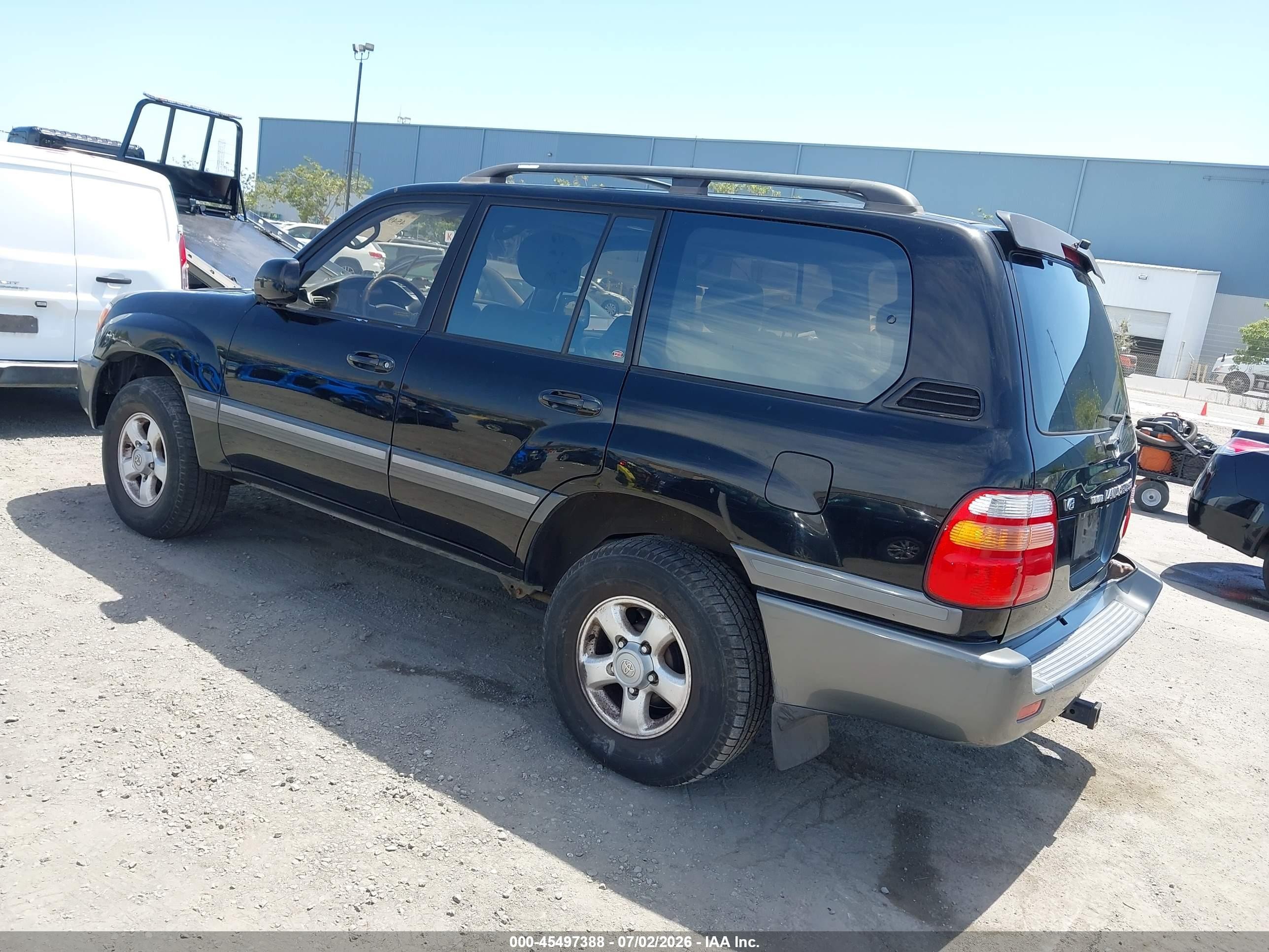 2000 Toyota Land Cruiser   Black vin: JT3HT05J8Y0105431