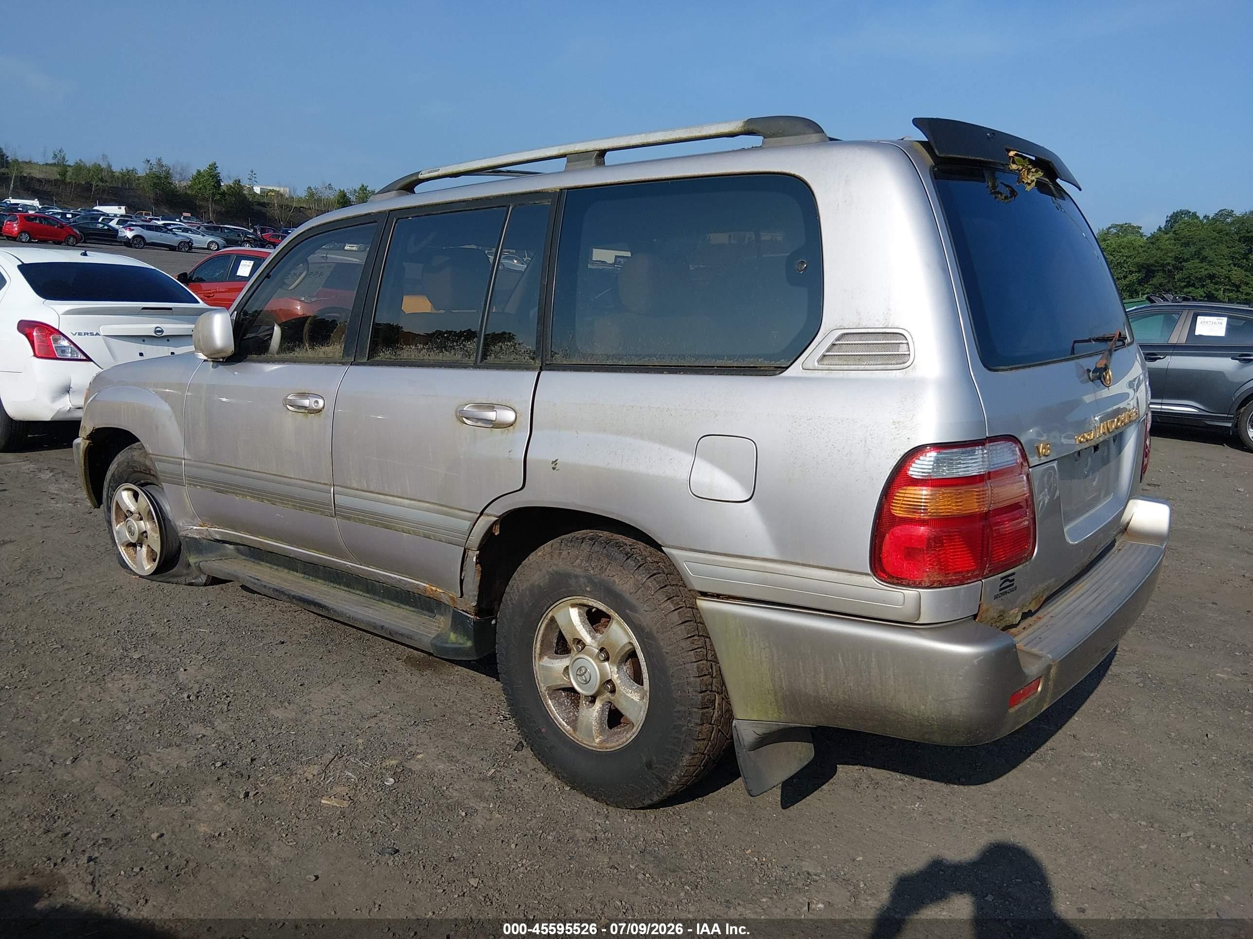 1999 Toyota Land Cruiser   Silver vin: JT3HT05J9X0062880