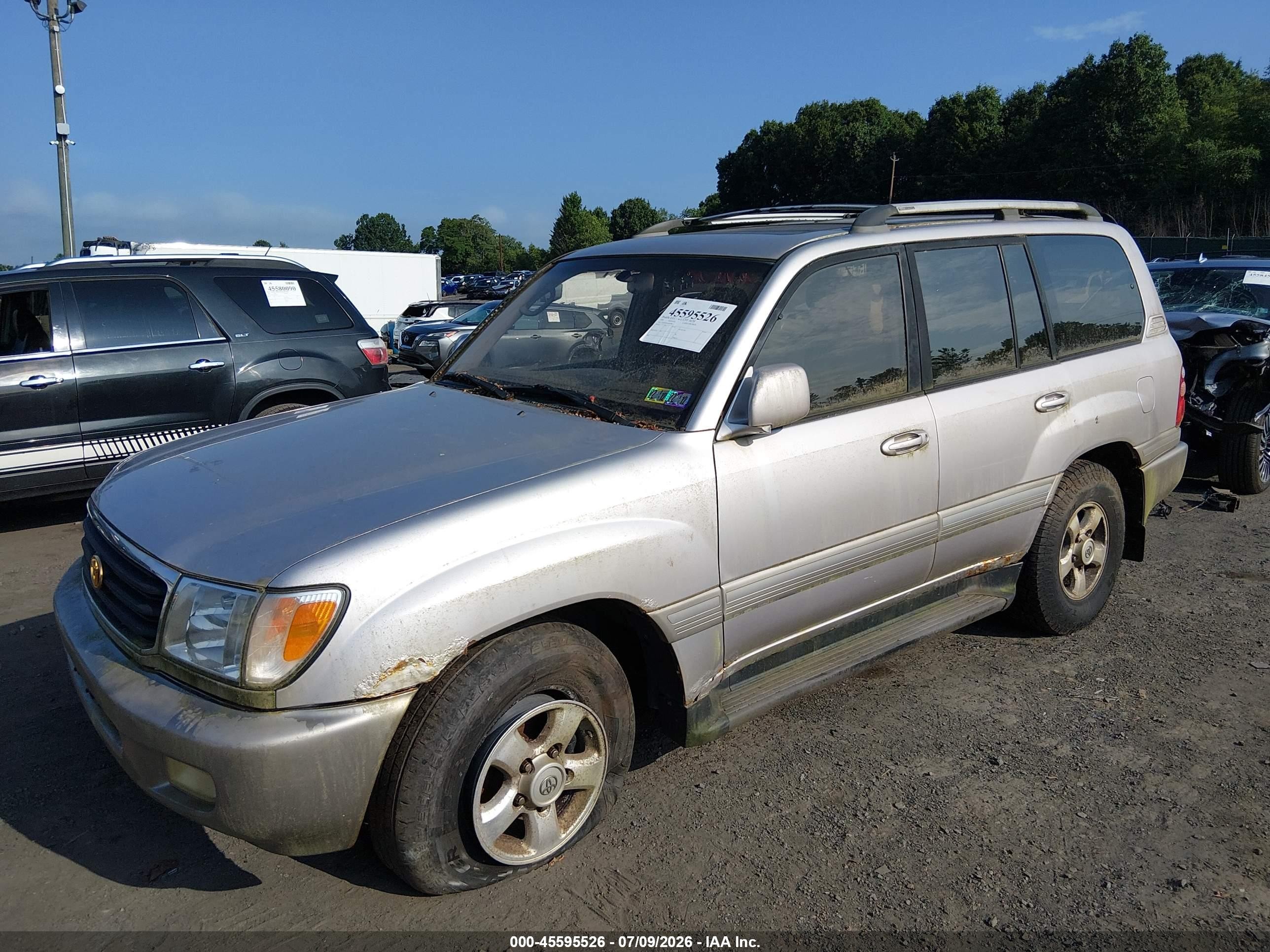 1999 Toyota Land Cruiser   Silver vin: JT3HT05J9X0062880