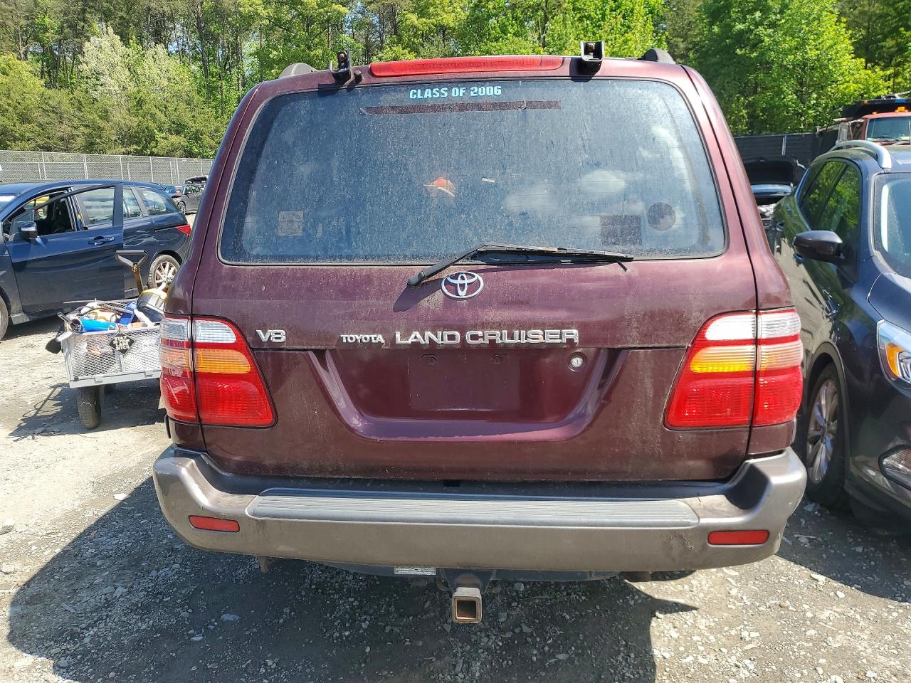1998 Toyota Land Cruiser Base Burgundy vin: JT3HT05JXW0018112