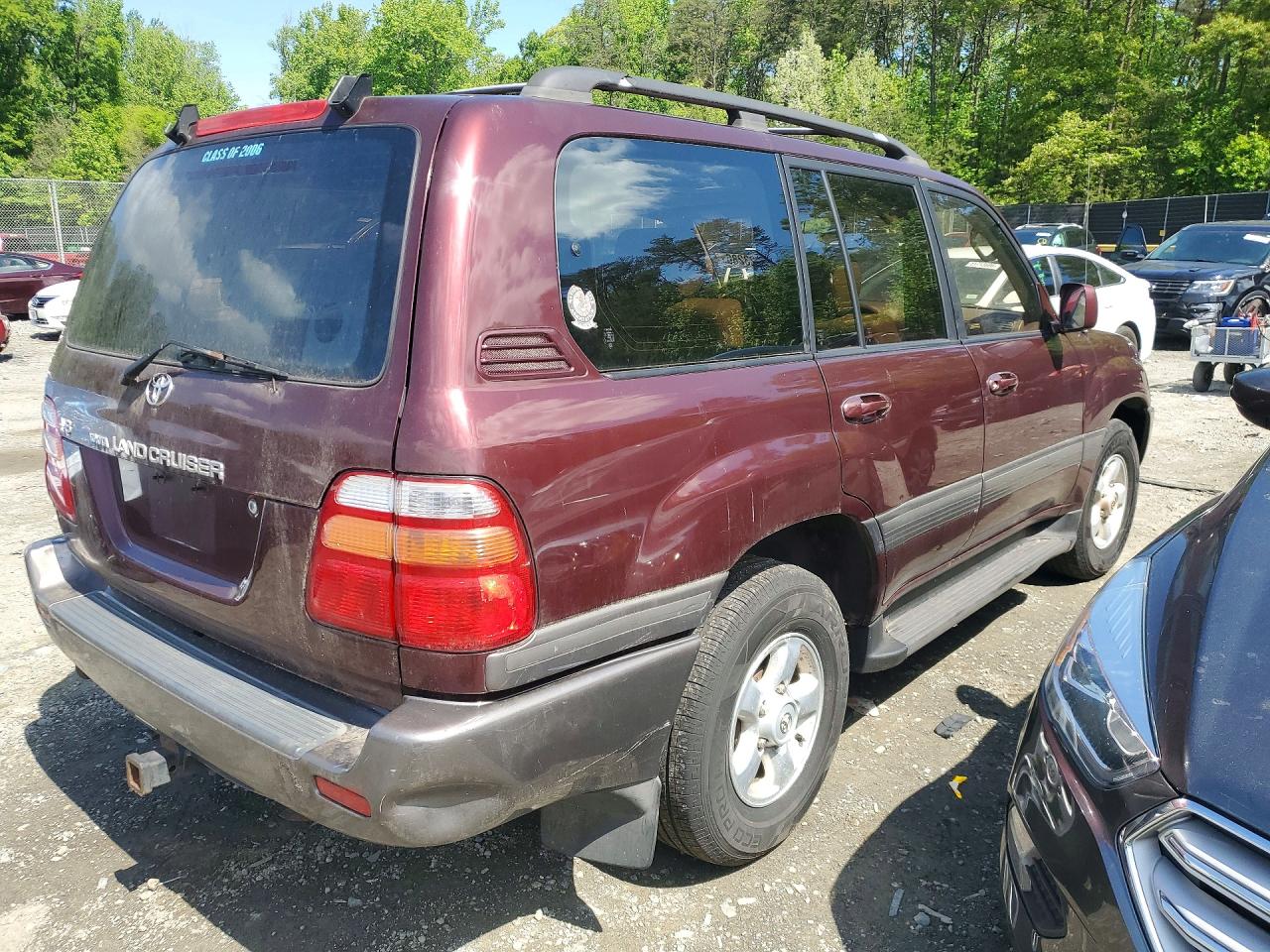 1998 Toyota Land Cruiser Base Burgundy vin: JT3HT05JXW0018112