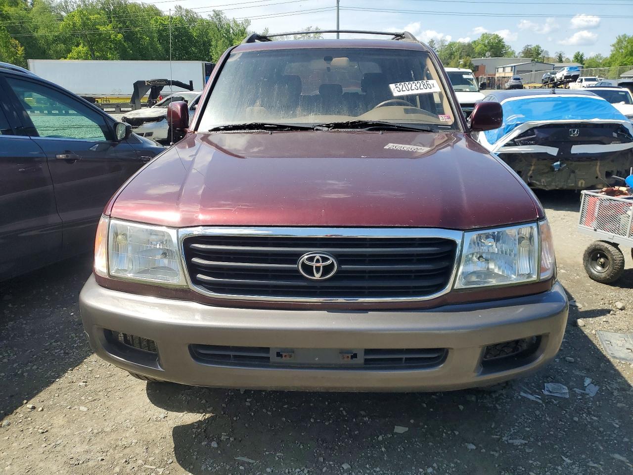 1998 Toyota Land Cruiser Base Burgundy vin: JT3HT05JXW0018112