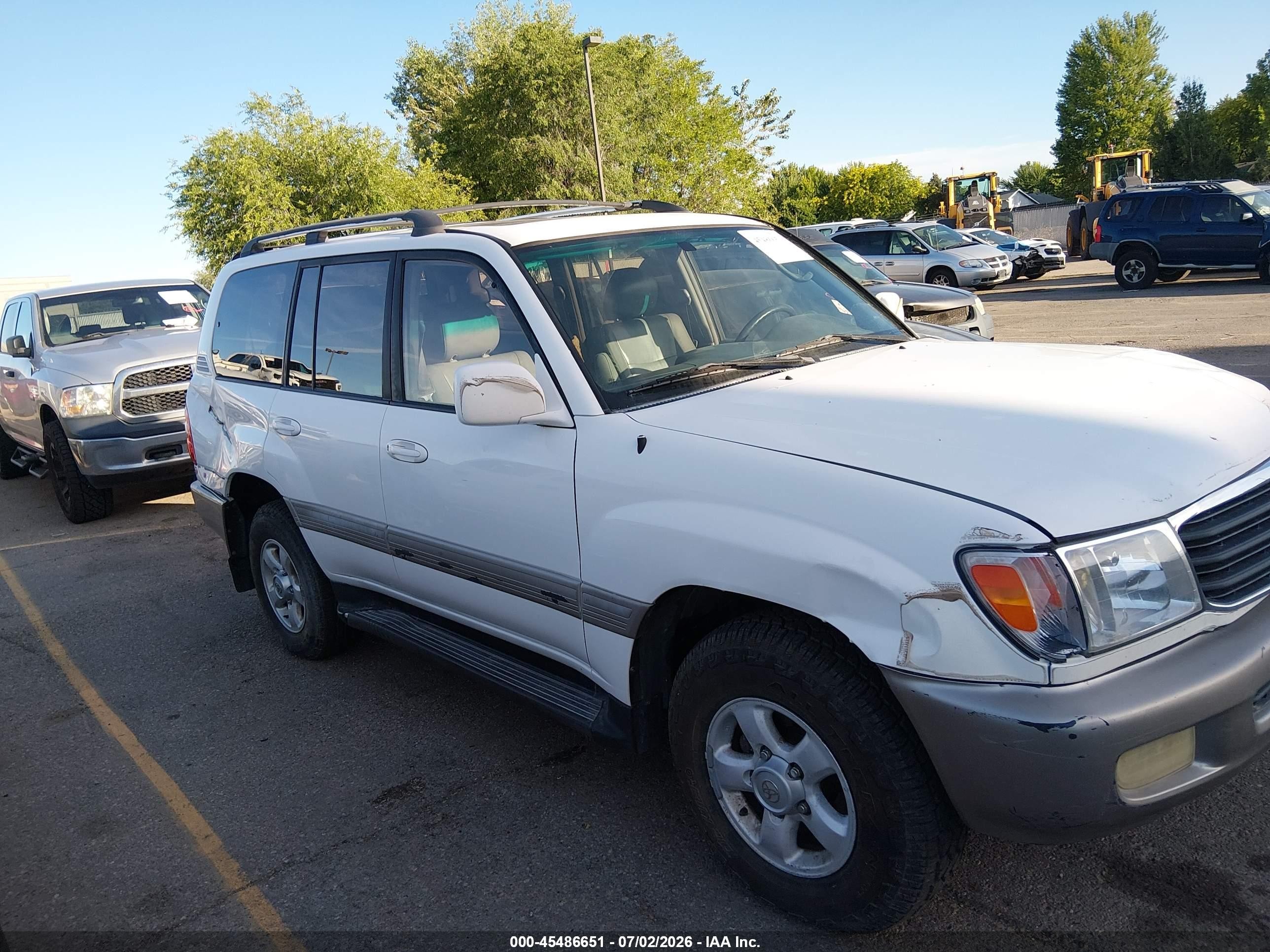 1999 Toyota Land Cruiser   White vin: JT3HT05JXX0044100