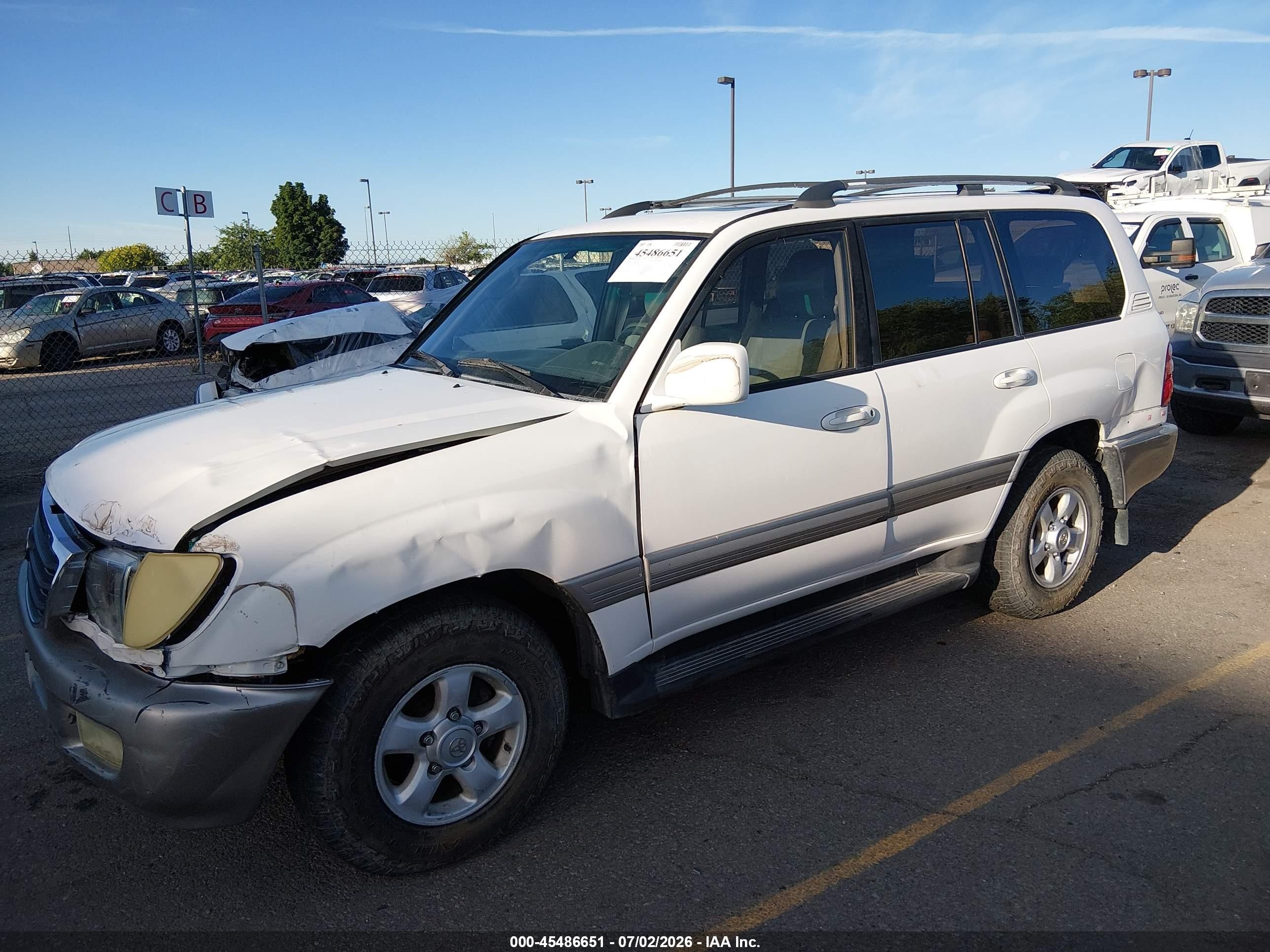 1999 Toyota Land Cruiser   White vin: JT3HT05JXX0044100