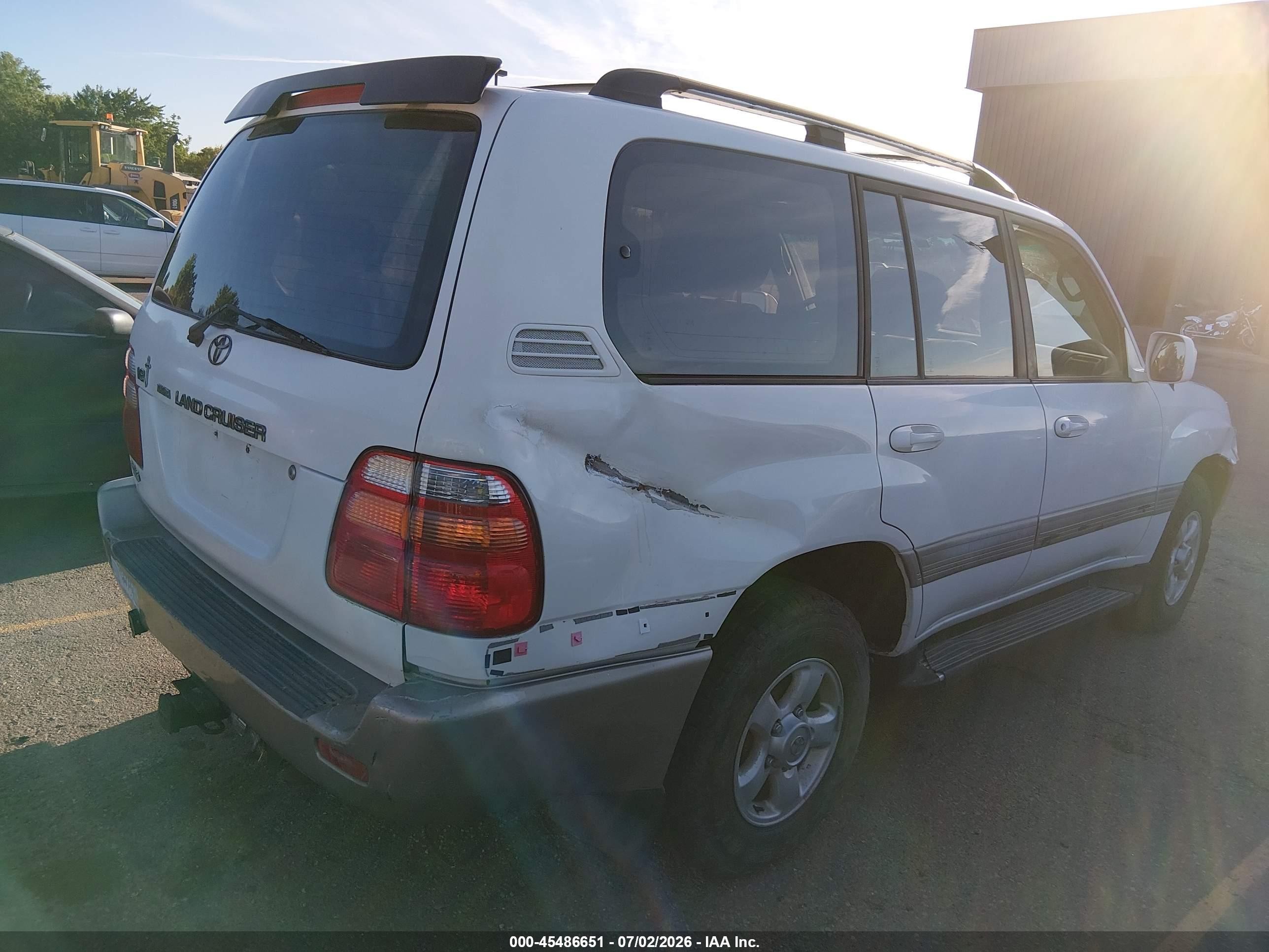 1999 Toyota Land Cruiser   White vin: JT3HT05JXX0044100