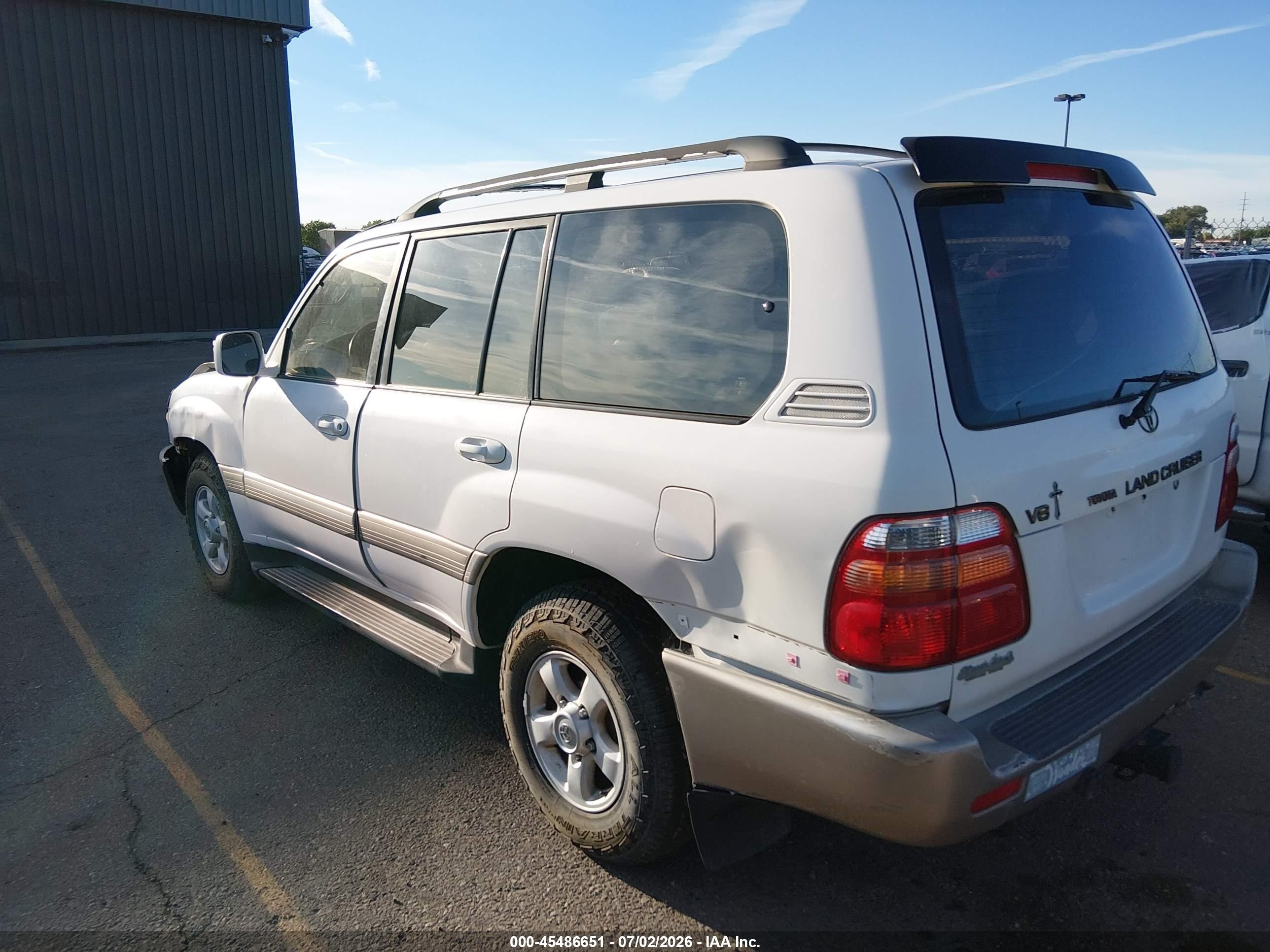 1999 Toyota Land Cruiser   White vin: JT3HT05JXX0044100