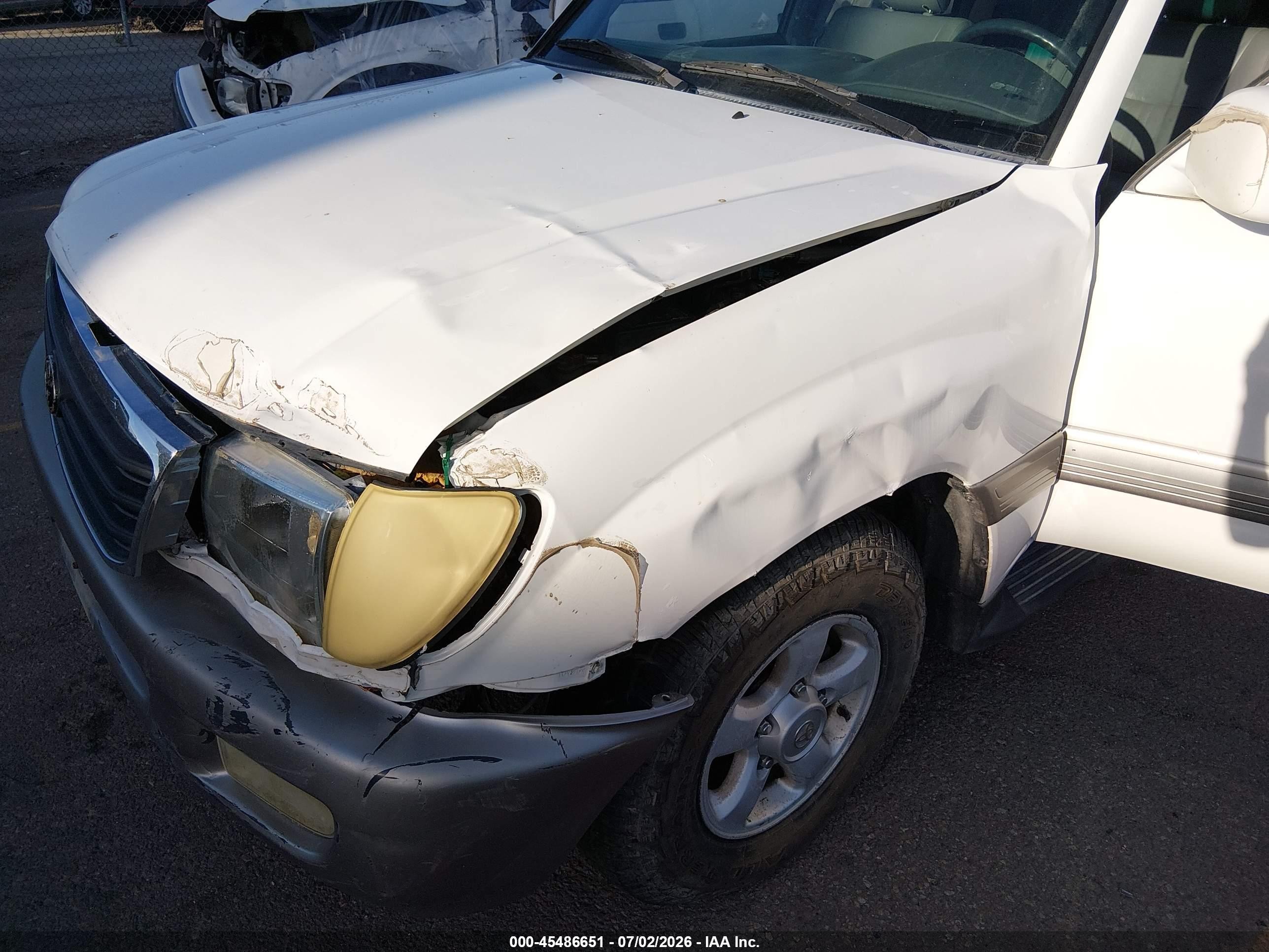 1999 Toyota Land Cruiser   White vin: JT3HT05JXX0044100