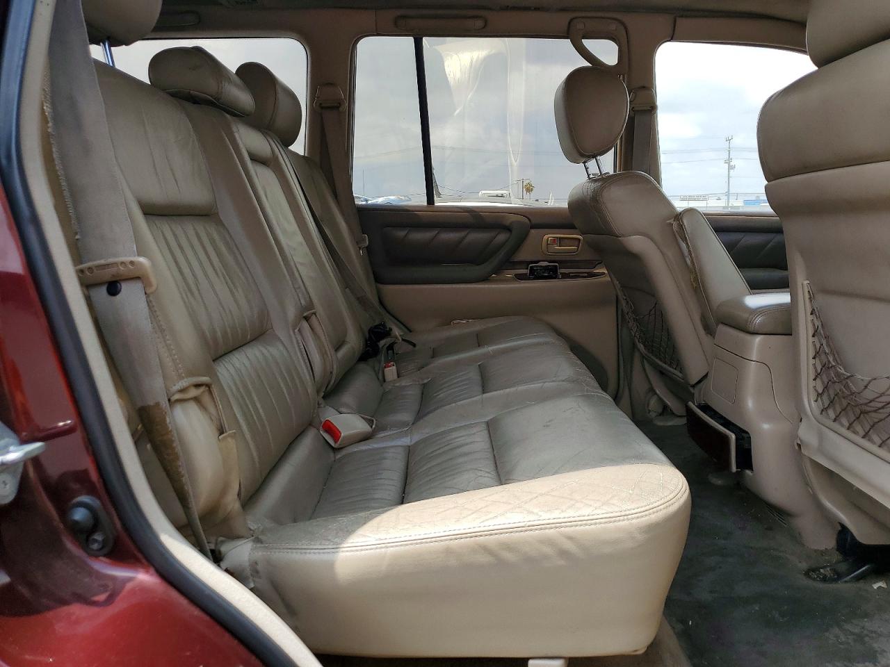 2000 Toyota Land Cruiser Base Burgundy vin: JT3HT05JXY0092567