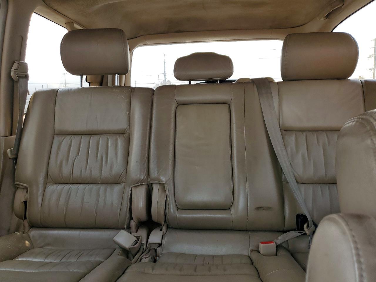 2000 Toyota Land Cruiser Base Burgundy vin: JT3HT05JXY0092567