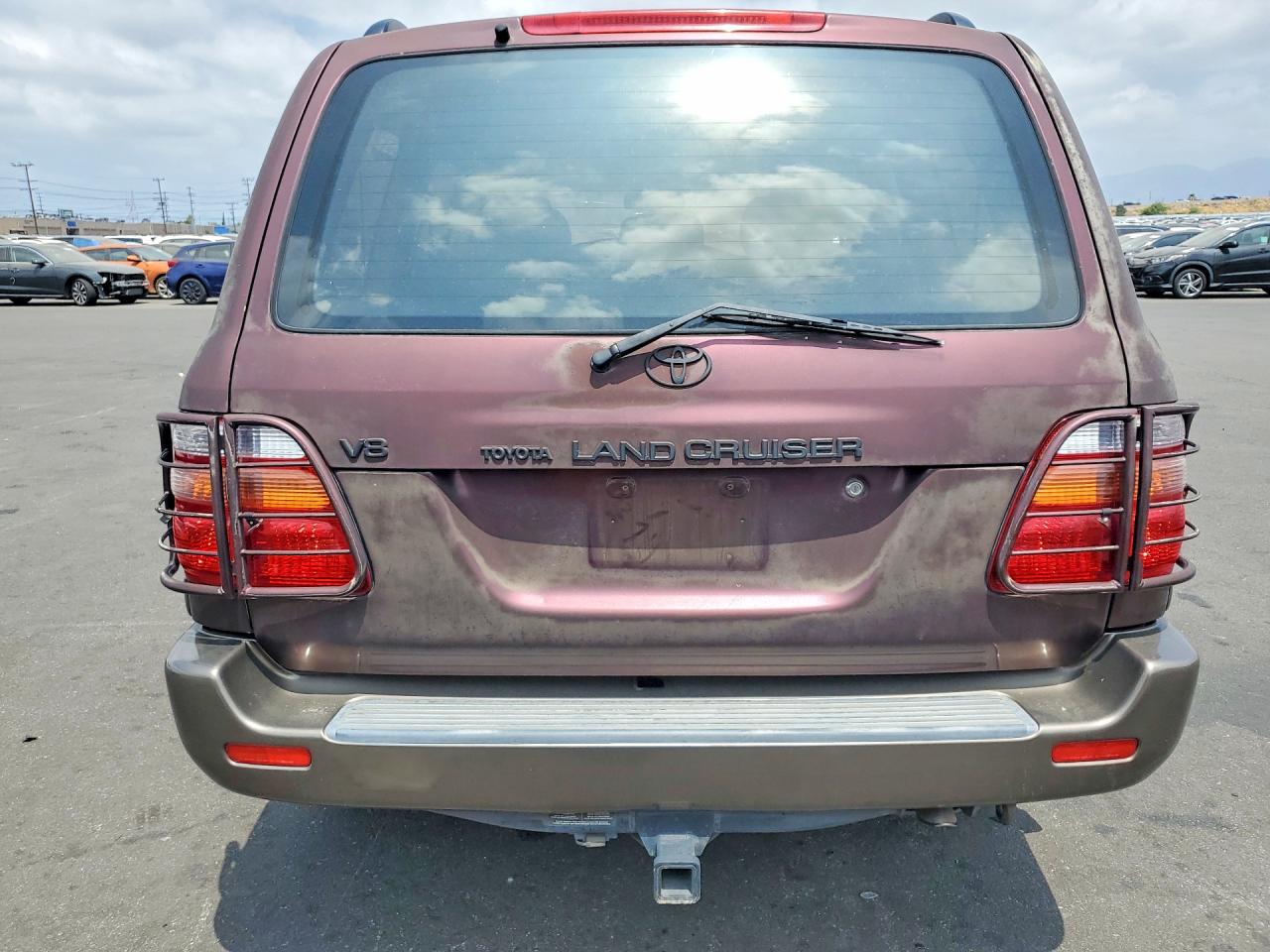 2000 Toyota Land Cruiser Base Burgundy vin: JT3HT05JXY0092567