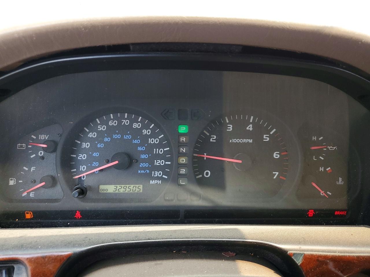 2000 Toyota Land Cruiser Base Burgundy vin: JT3HT05JXY0092567
