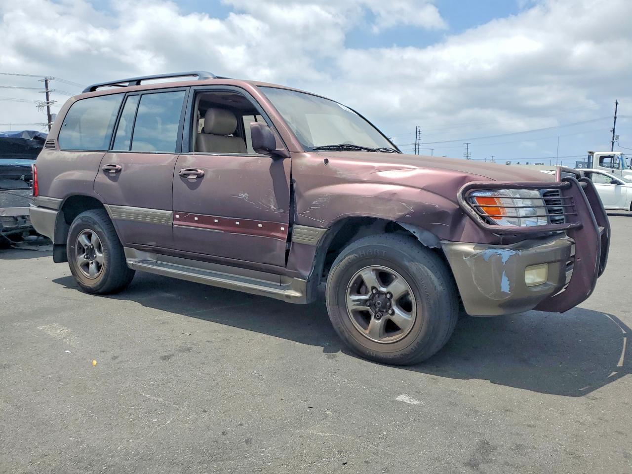 2000 Toyota Land Cruiser Base Burgundy vin: JT3HT05JXY0092567