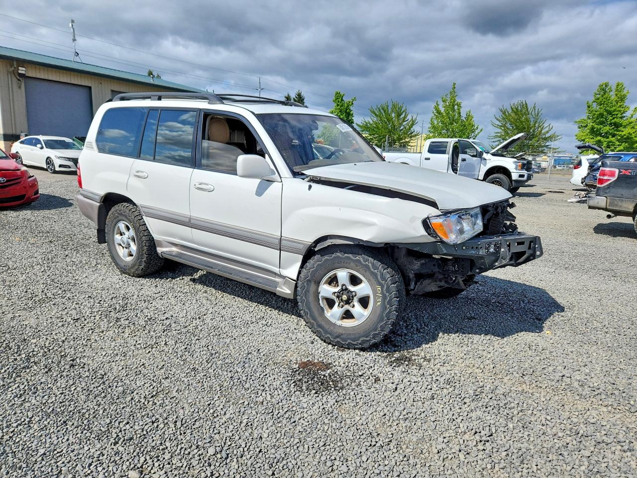 2000 Toyota Land Cruiser Base White vin: JT3HT05JXY0124644