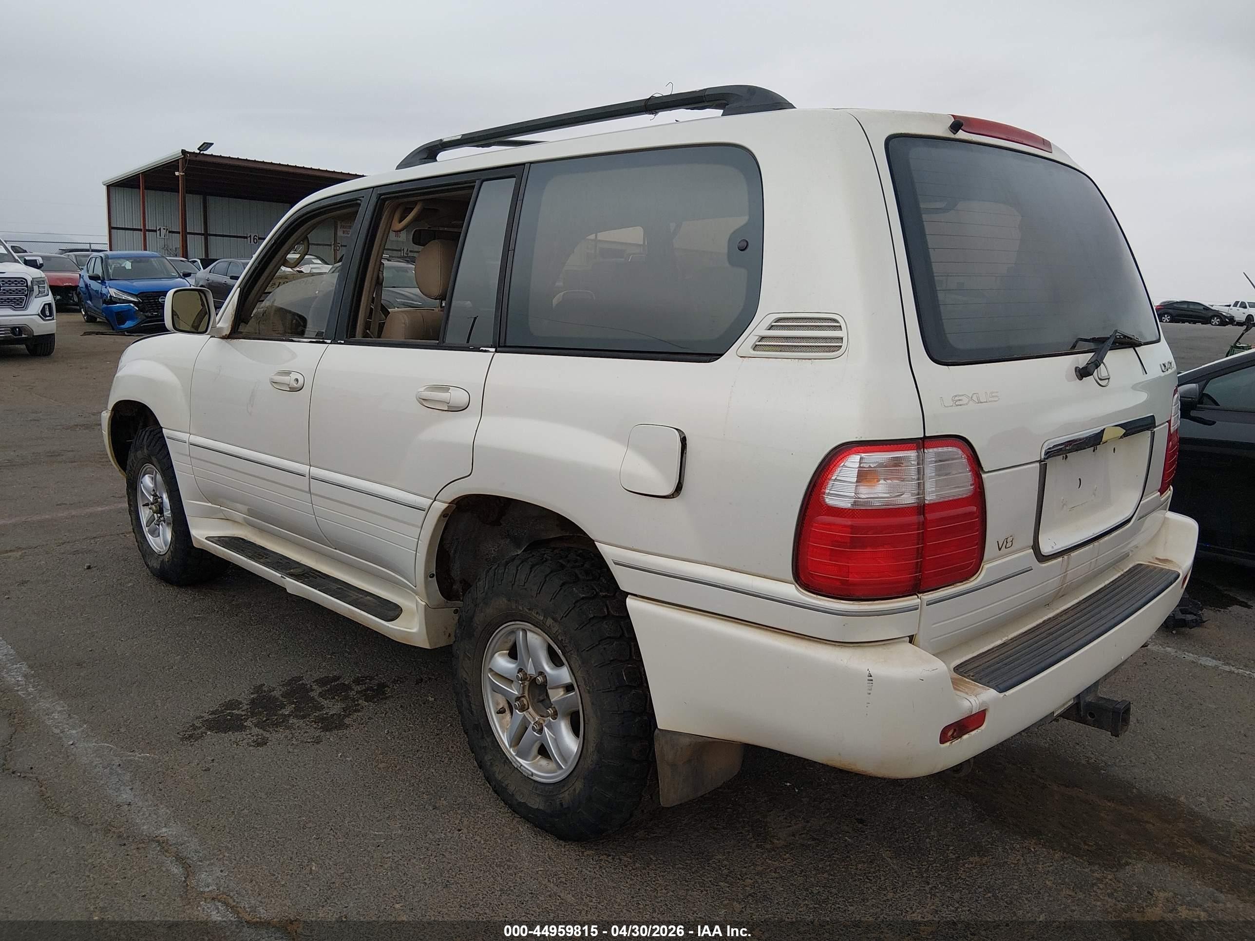 1999 Lexus Lx 470   White vin: JT6HT00W0X0074468