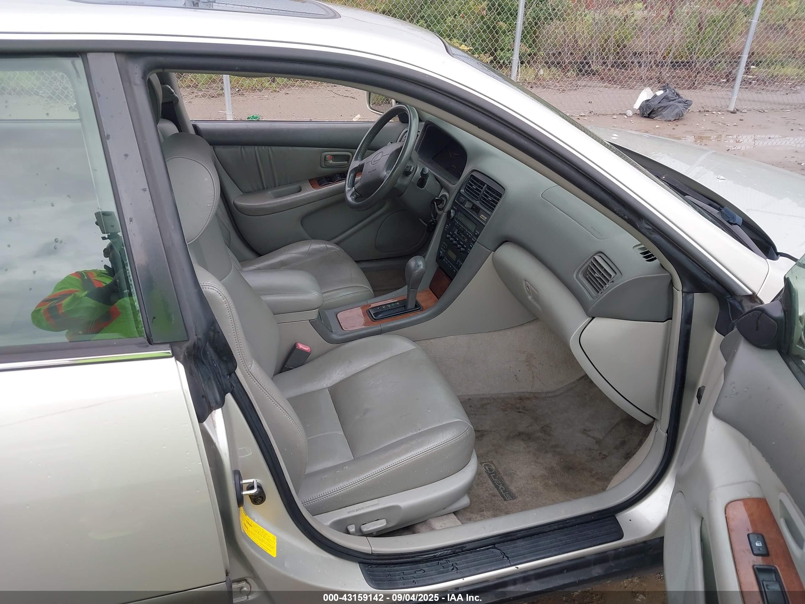 1999 Lexus Es 300   Champagne vin: JT8BF28G7X5064035