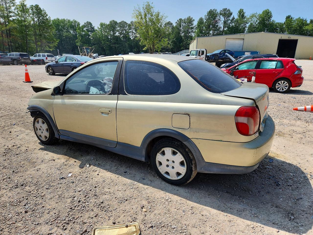 2001 Toyota Echo Base Золотой vin: JTDAT123510158182