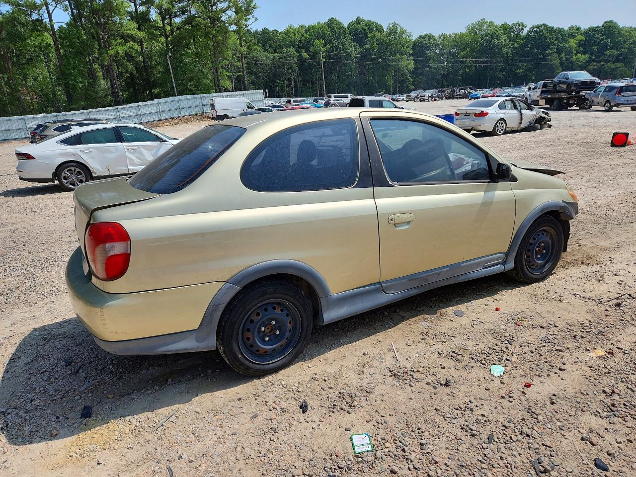 2001 Toyota Echo Base Золотой vin: JTDAT123510158182