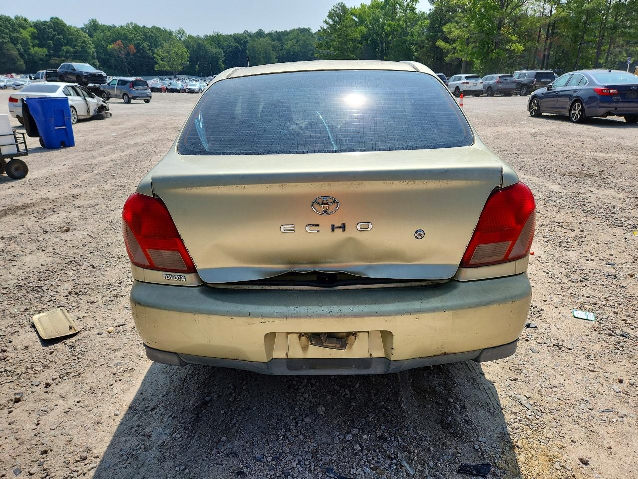 2001 Toyota Echo Base Золотой vin: JTDAT123510158182