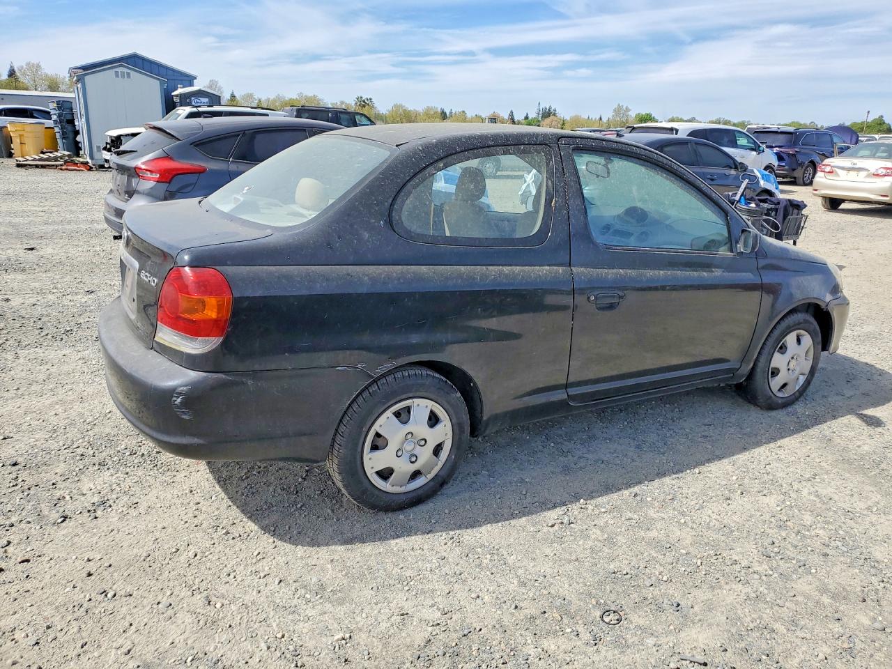 2003 Toyota Echo Черный vin: JTDAT123730278469