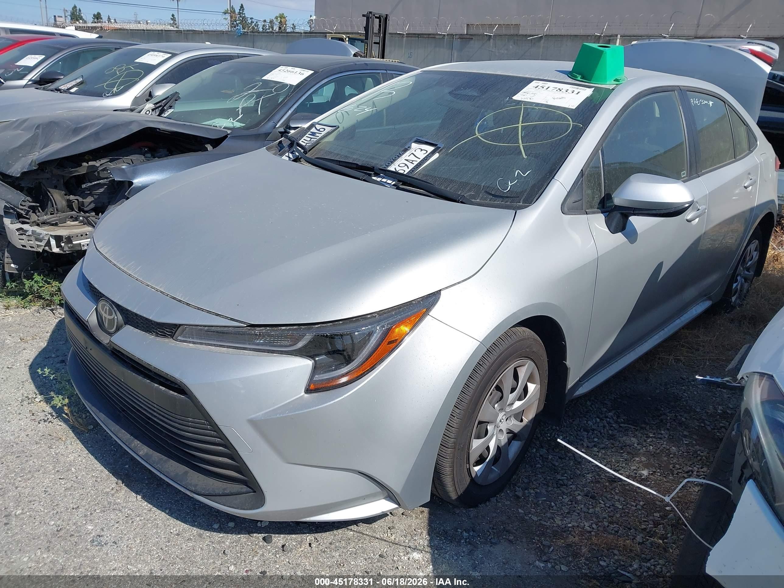 2026 Toyota Corolla Le Silver vin: JTDB4MEE1T3034587