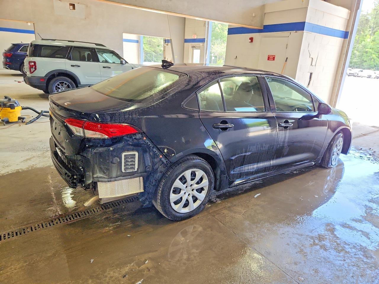 2024 Toyota Corolla Le Black vin: JTDB4MEE4R3016643