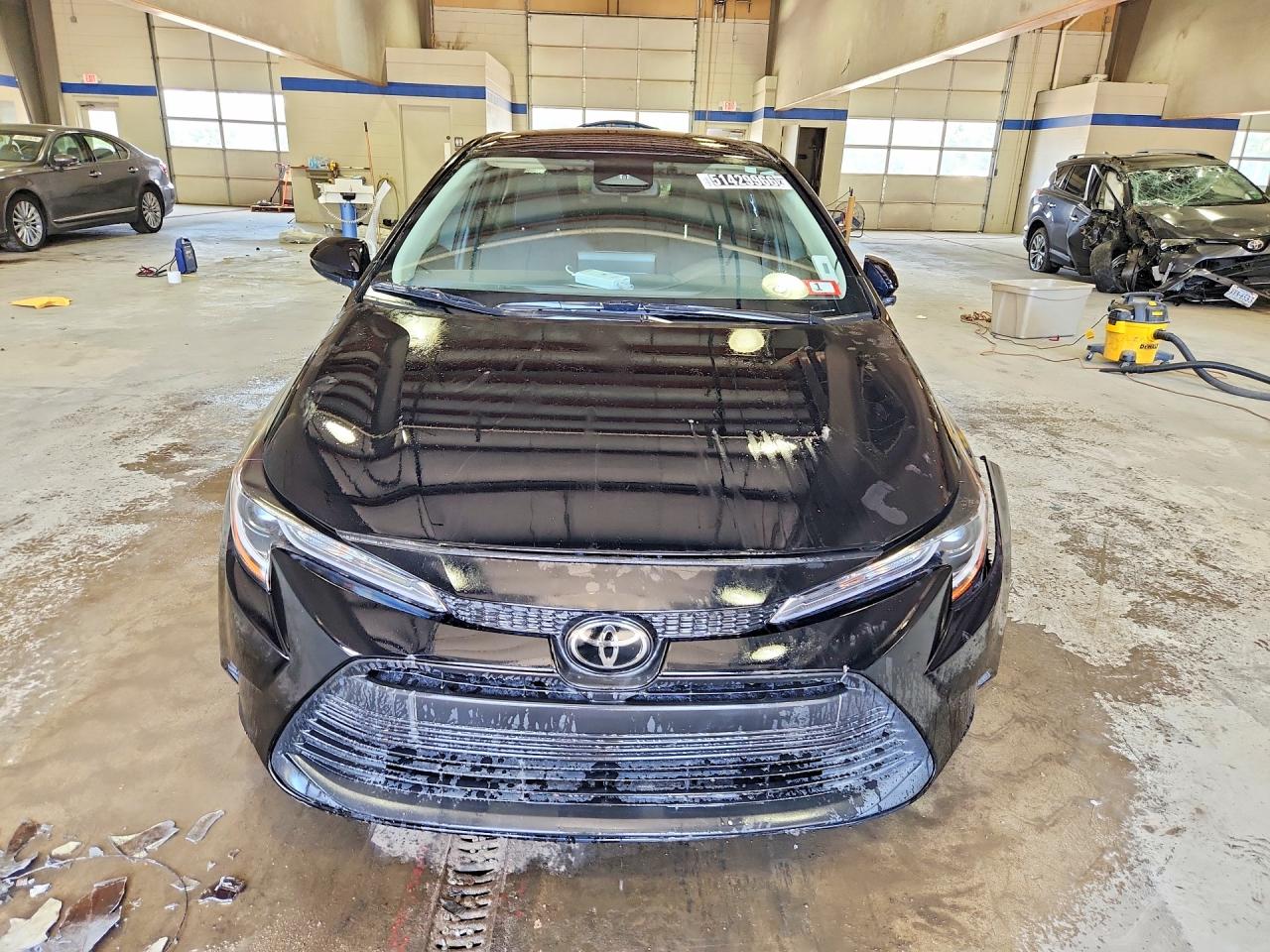2024 Toyota Corolla Le Black vin: JTDB4MEE4R3016643