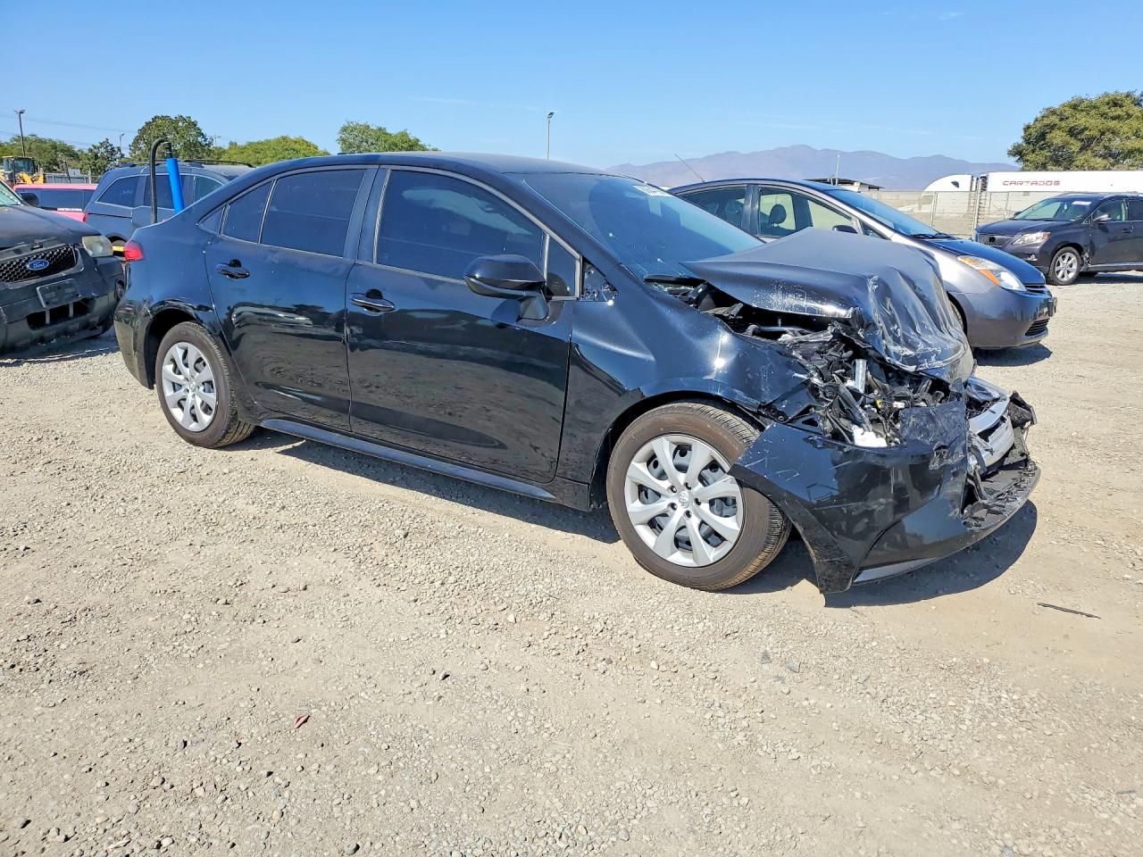 2026 Toyota Corolla Le Black vin: JTDB4MEE8T3033002