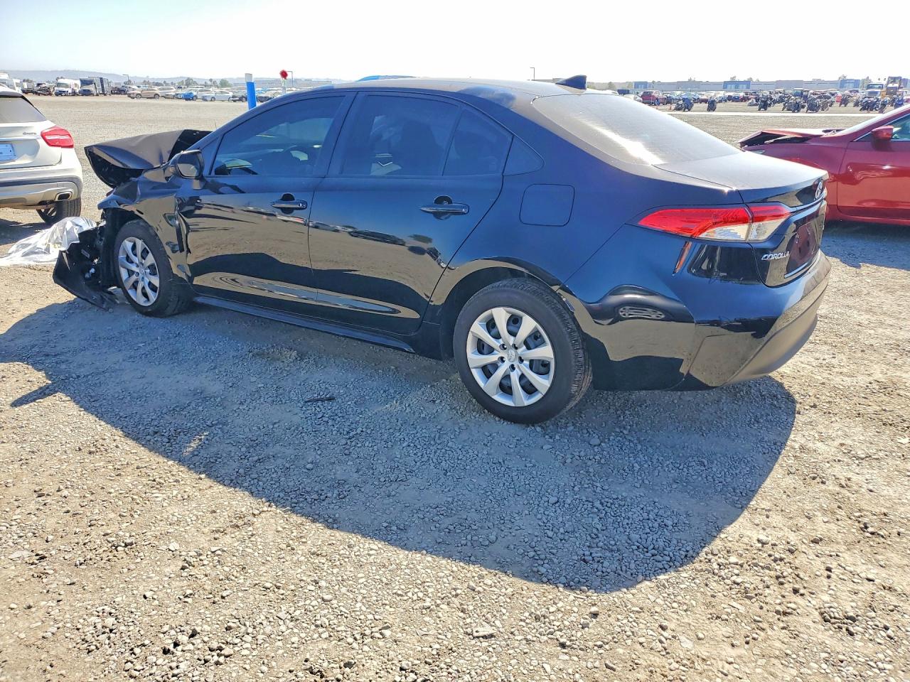 2026 Toyota Corolla Le Black vin: JTDB4MEE8T3033002