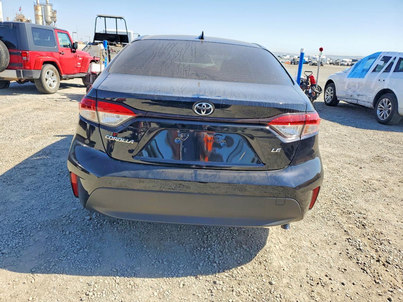 2026 Toyota Corolla Le Black vin: JTDB4MEE8T3033002