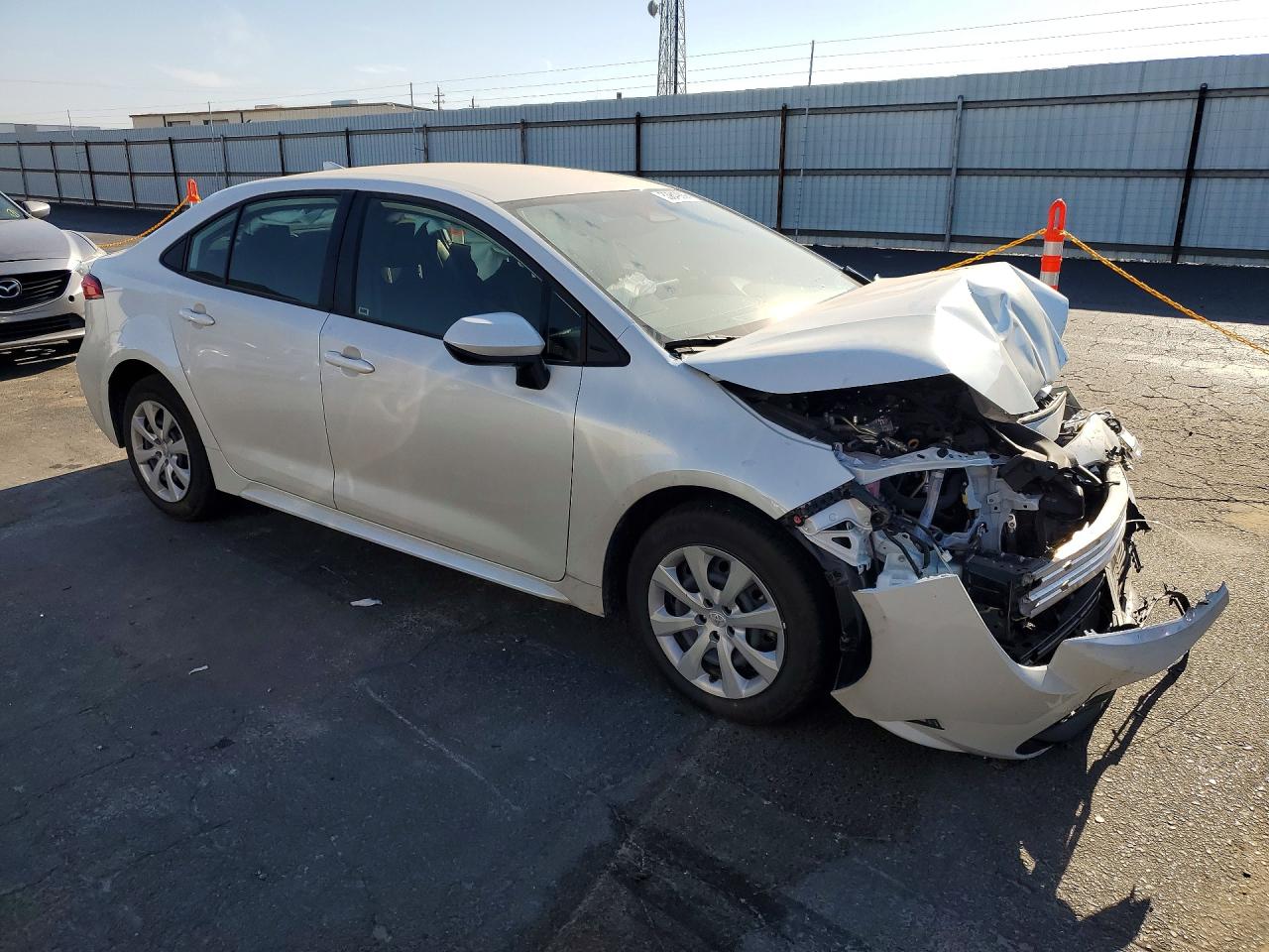 2026 Toyota Corolla Hybrid Le White vin: JTDBCMFE1T3118412
