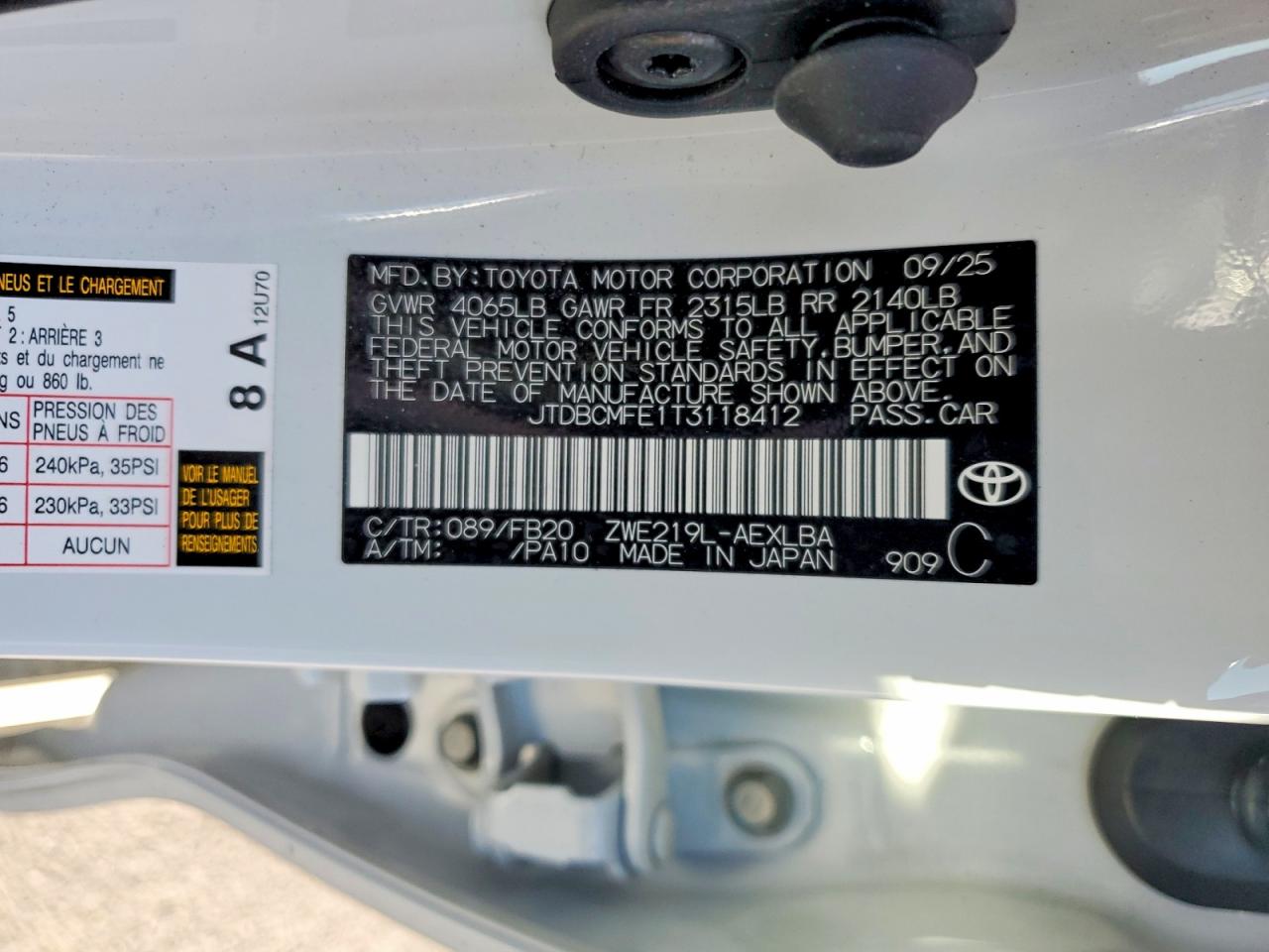 2026 Toyota Corolla Hybrid Le White vin: JTDBCMFE1T3118412