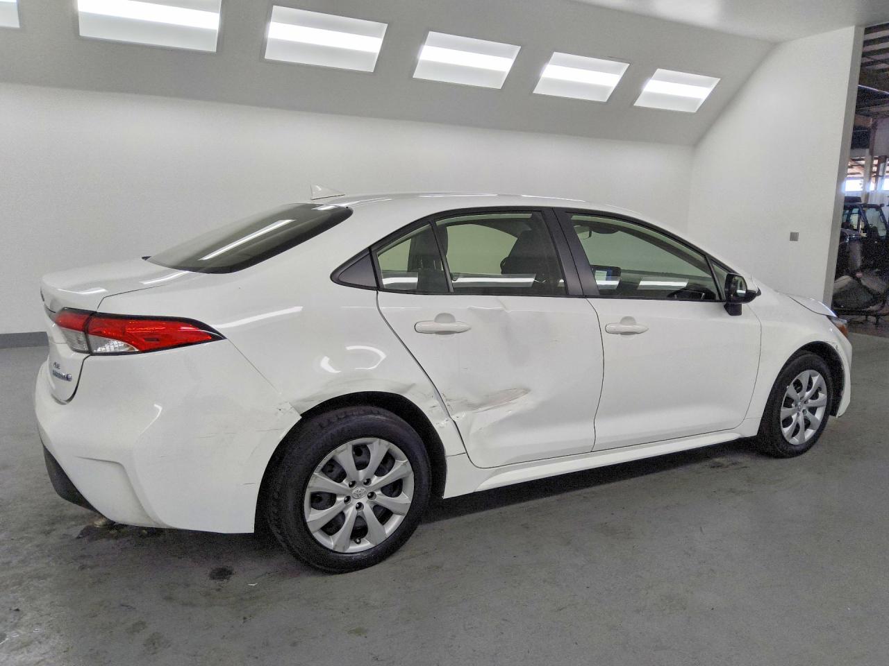 2023 Toyota Corolla Hybrid Le White vin: JTDBCMFE2P3002352