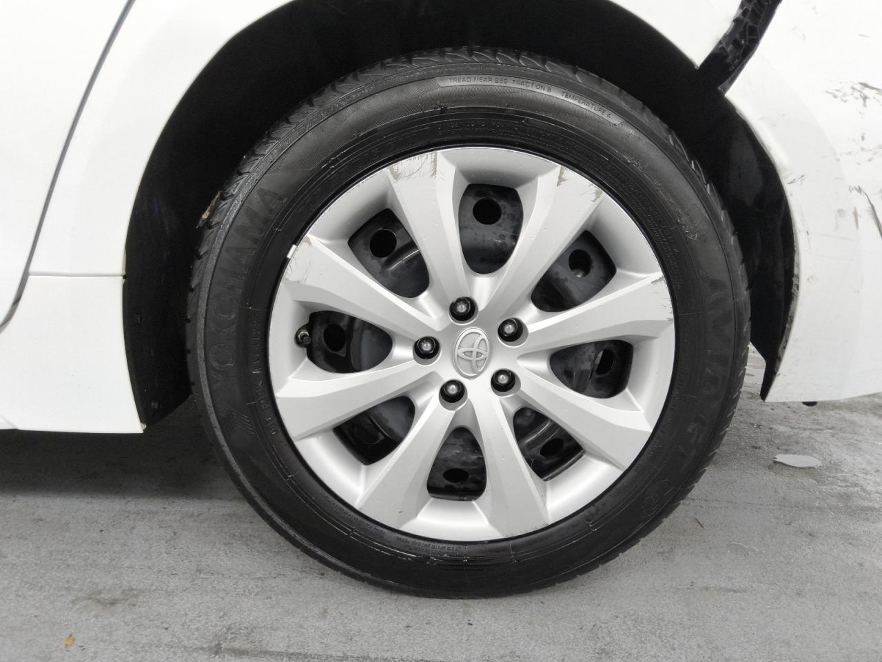 2023 Toyota Corolla Hybrid Le White vin: JTDBCMFE2P3002352 Damage: Left Rear Wheel Cover, Curb Rash, > 12 Inches