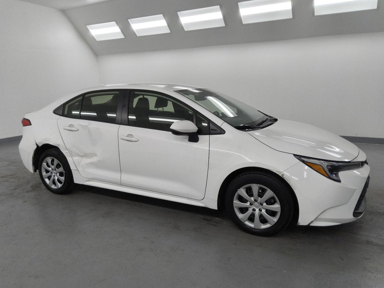 2023 Toyota Corolla Hybrid Le White vin: JTDBCMFE2P3002352 Damage: Right Front Tire, Worn, Replacement Required