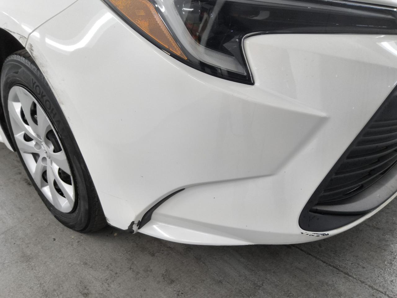2023 Toyota Corolla Hybrid Le White vin: JTDBCMFE2P3002352 Damage: Front Bumper, Curb Rash, 4 To 5 Inches