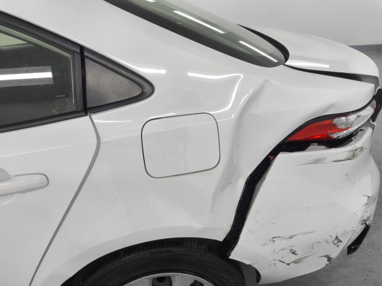 2023 Toyota Corolla Hybrid Le White vin: JTDBCMFE2P3002352 Damage: Left Qtr Panel, Dent(S) W/ Paint Dmg, > 12 Inches
