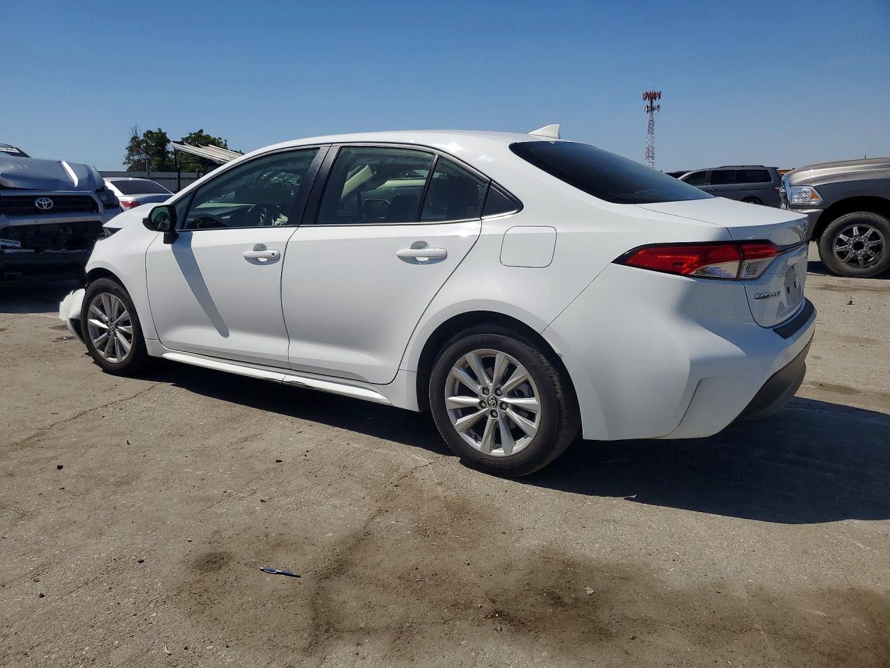 2025 Toyota Corolla Hybrid Le White vin: JTDBCMFE2SJ037817