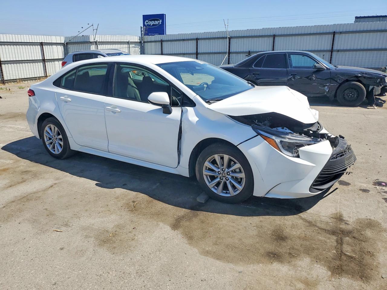2025 Toyota Corolla Hybrid Le White vin: JTDBCMFE2SJ037817