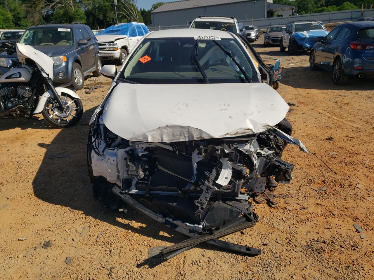 2024 Toyota Corolla Hybrid Le White vin: JTDBCMFE3R3048503 Damage: Front Bumper Reinforcement, Missing, Replacement Required