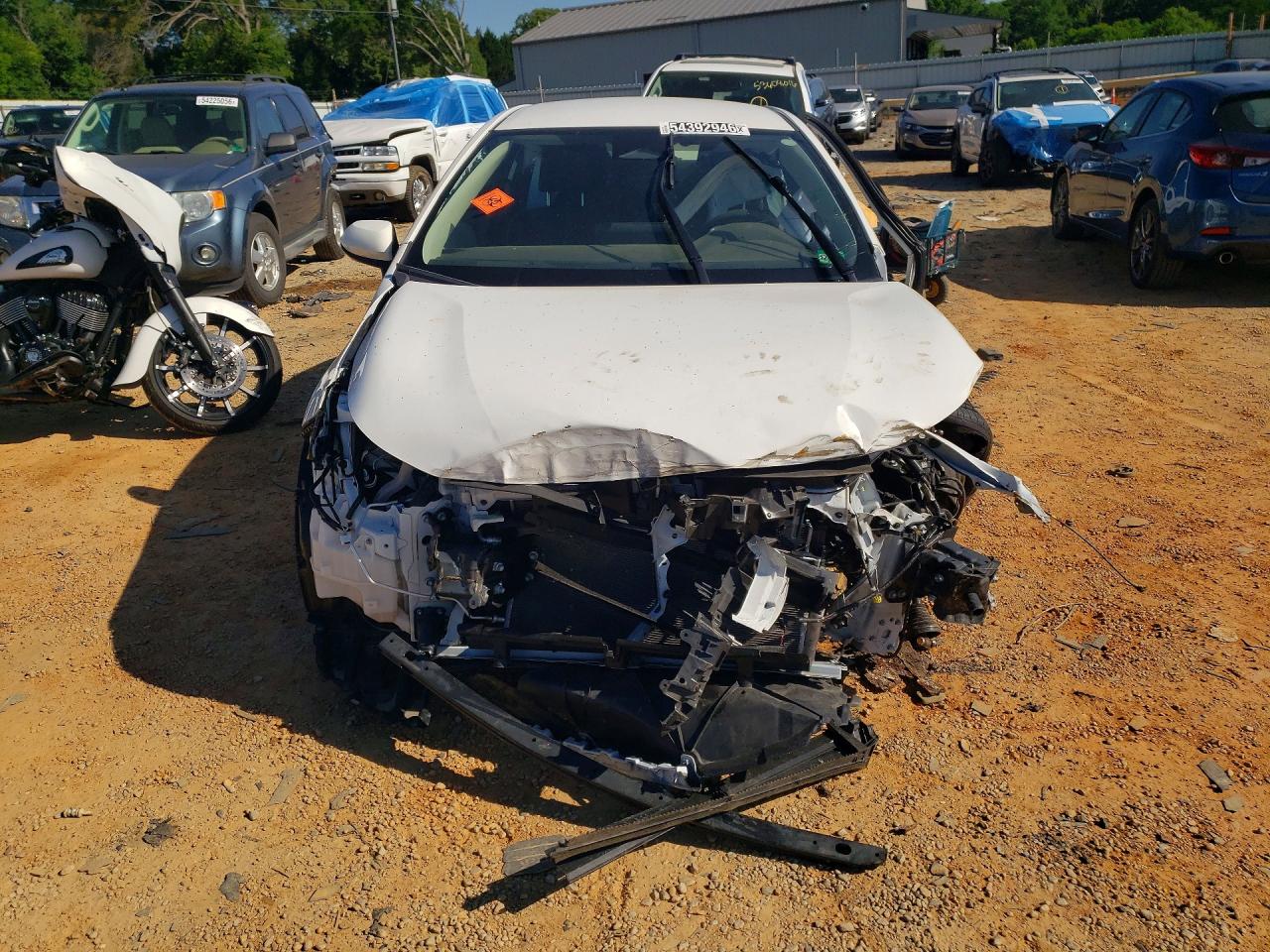 2024 Toyota Corolla Hybrid Le White vin: JTDBCMFE3R3048503