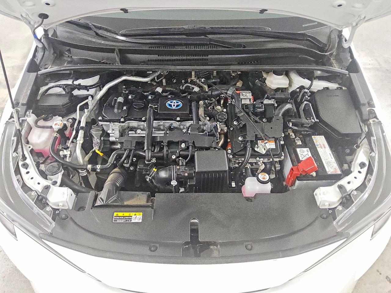 2024 Toyota Corolla Hybrid Le White vin: JTDBCMFE3R3062479